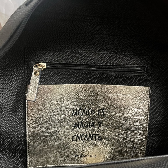 W Capsule Backpack with adjustable straps. Heart print on black material. - Picture 12 of 16